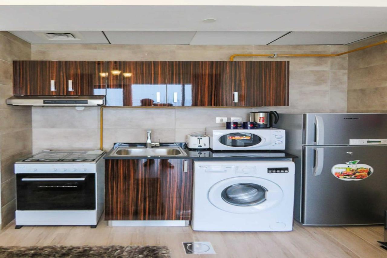 Oyo 860 Studio Apartment, Maya Tower 4, Jumeirah Village Triangle Dubai Luaran gambar