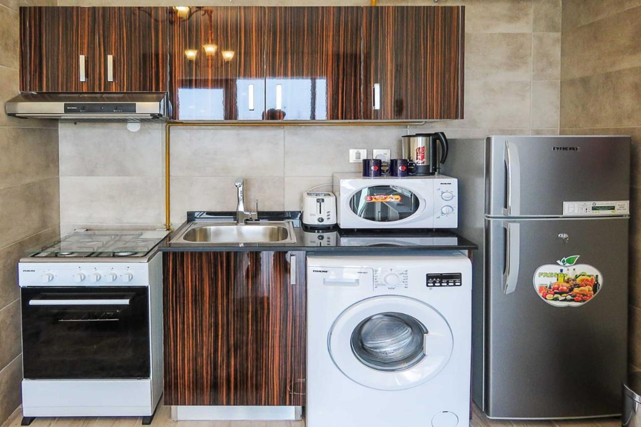 Oyo 860 Studio Apartment, Maya Tower 4, Jumeirah Village Triangle Dubai Luaran gambar
