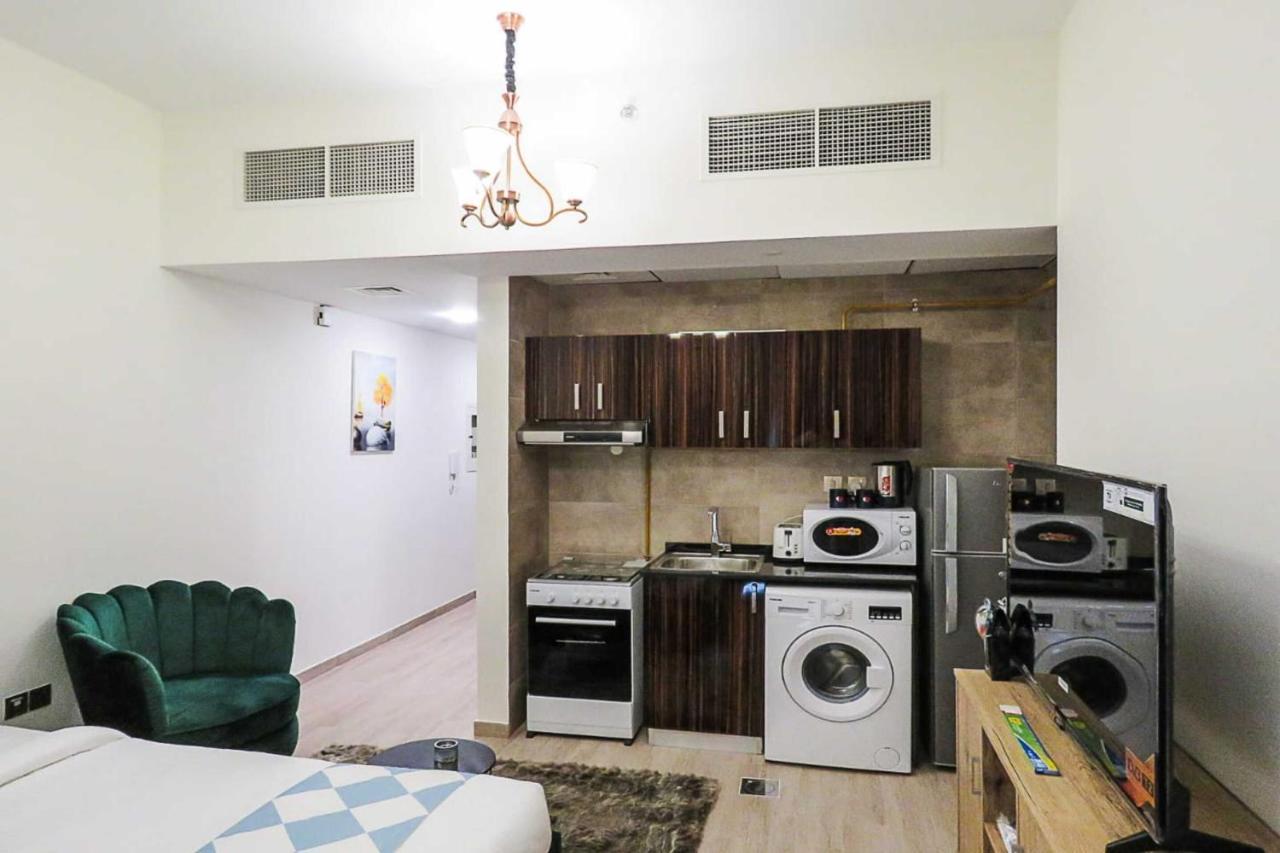 Oyo 860 Studio Apartment, Maya Tower 4, Jumeirah Village Triangle Dubai Luaran gambar