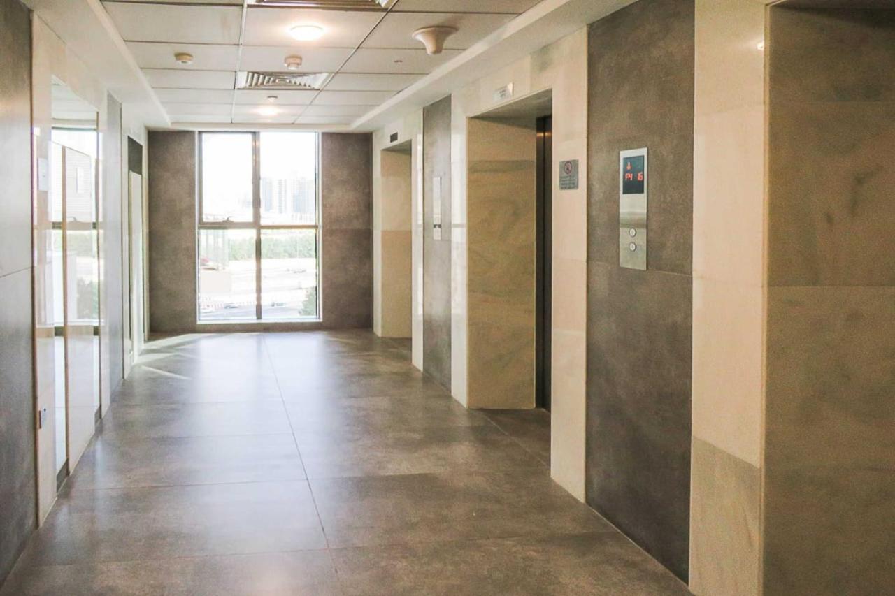 Oyo 860 Studio Apartment, Maya Tower 4, Jumeirah Village Triangle Dubai Luaran gambar
